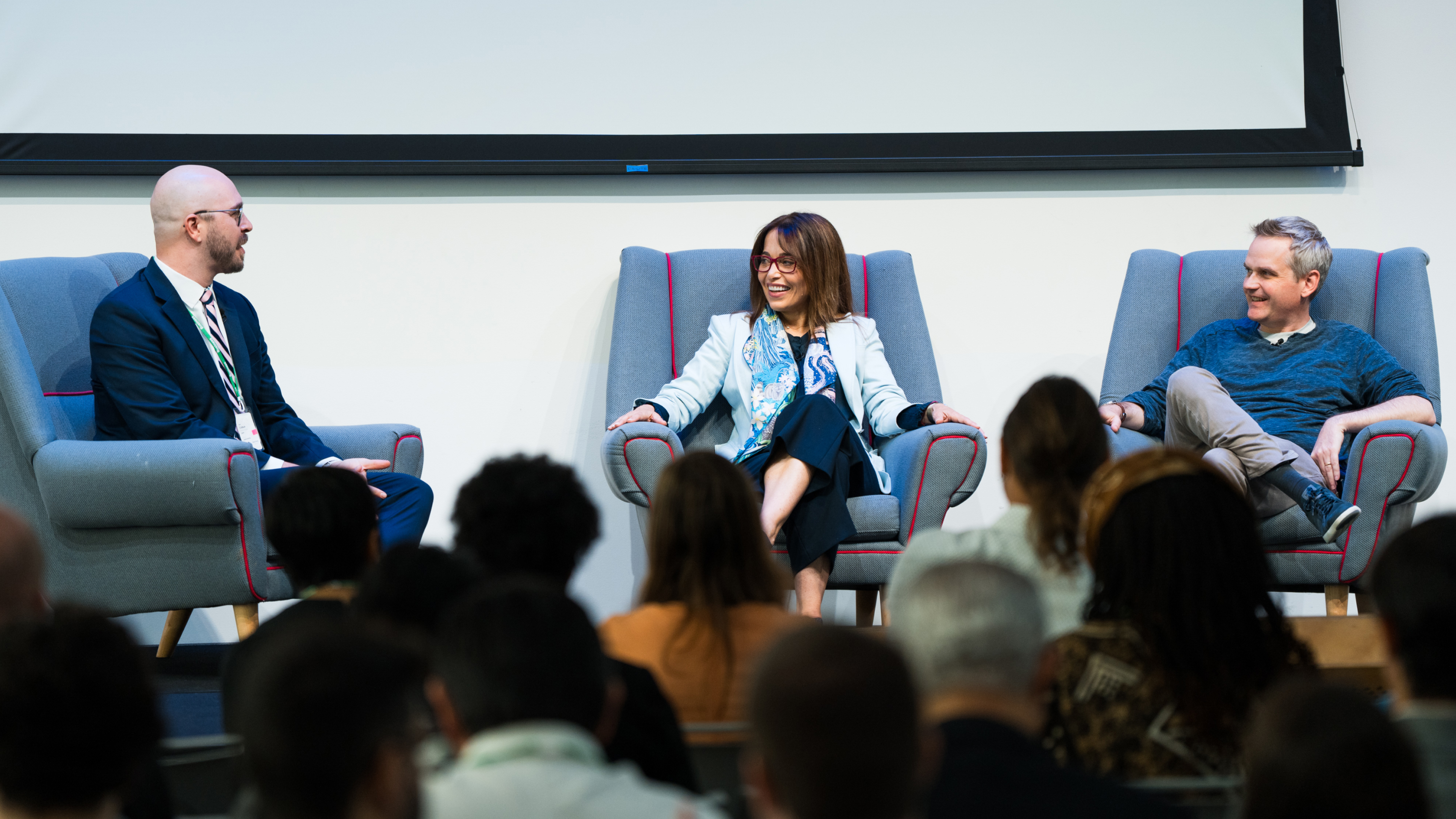 Photo of Cobun Zweifel Keggan, IAPP, speaking with Meta CPOs Erin Egan and Michel Protti